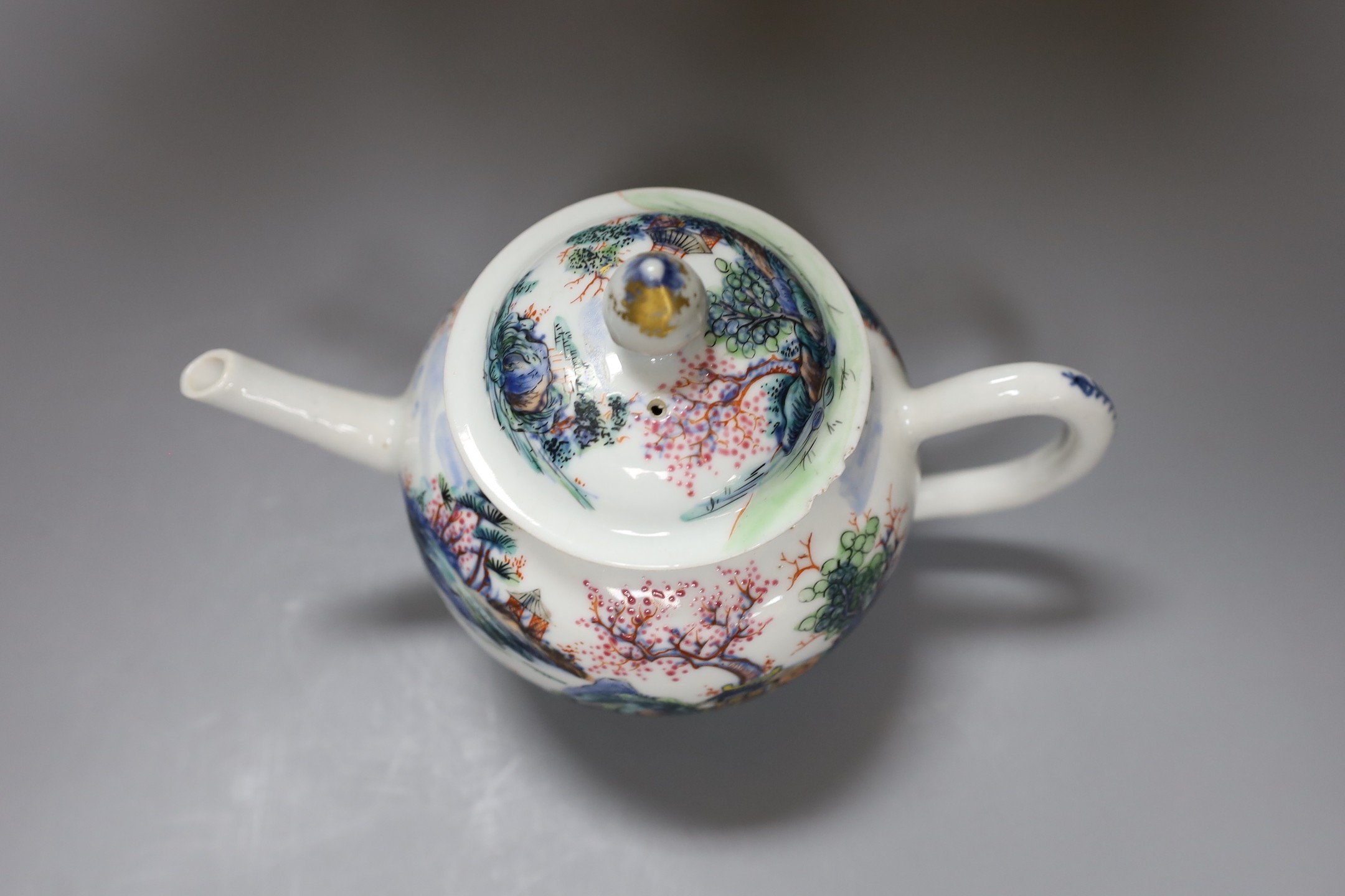 A Qianlong famille painted rose bullet shaped teapot and cover, 13.5cm tall